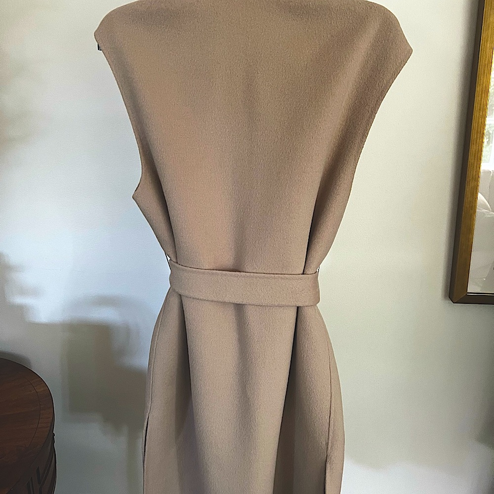 Elie Tahari sleeveless wool vest coat with fur trimmed pockets and belt.